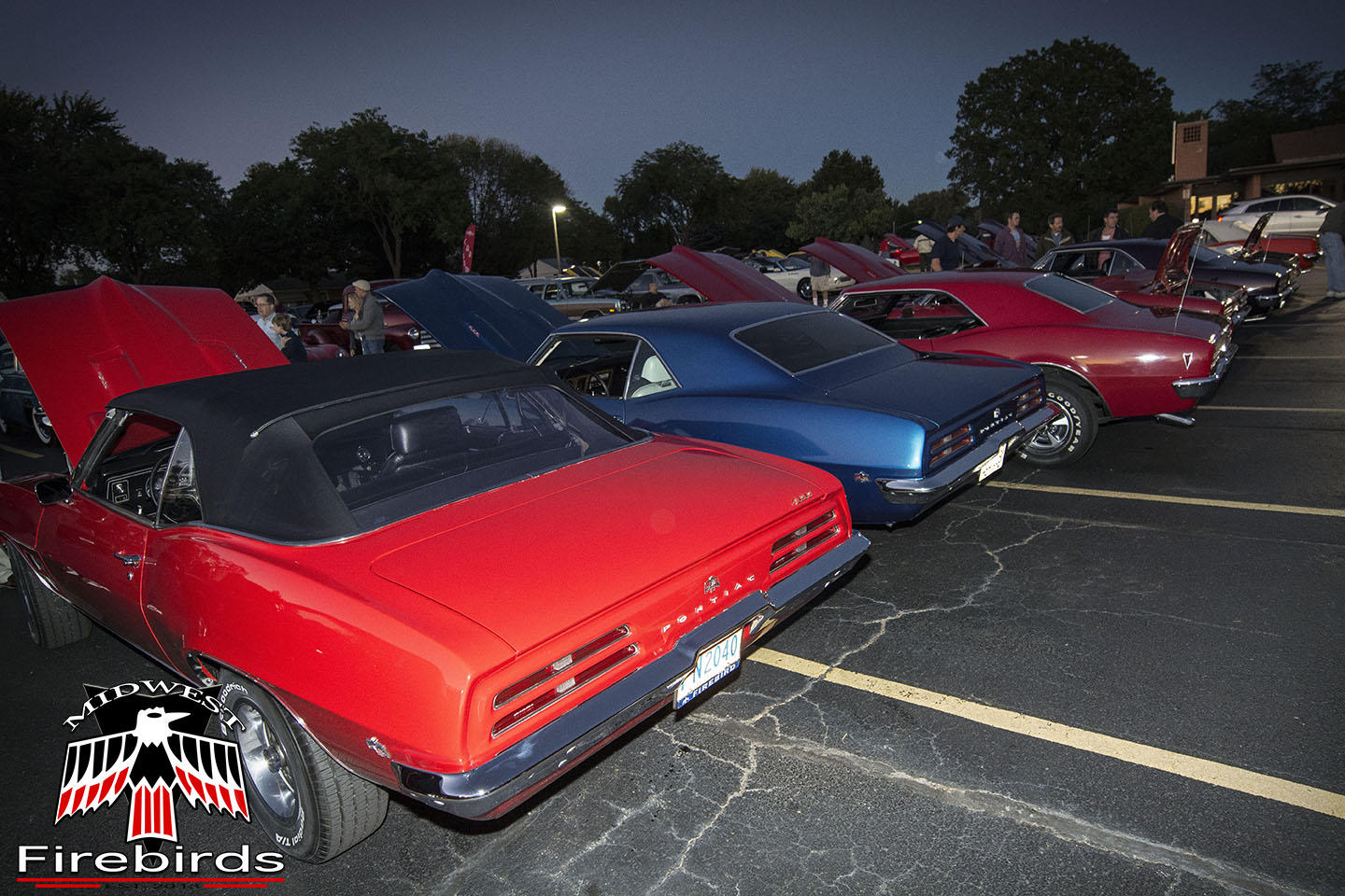 First generation Firebirds parked at the 2013 Rolling Meadows cruise night in Rolling Meadows, IL.