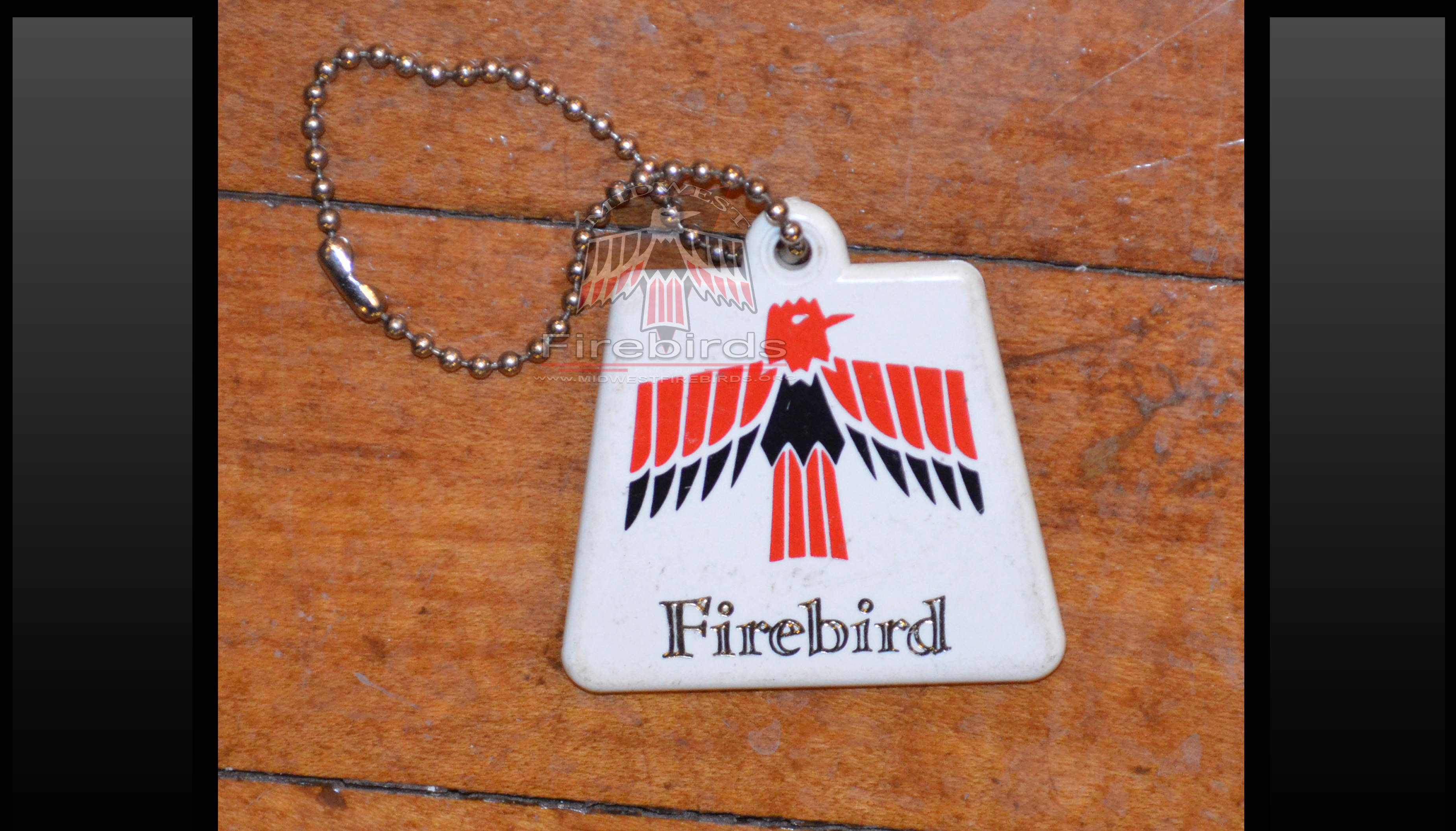 Vintage dealer promo Pontiac Firebird keychain.